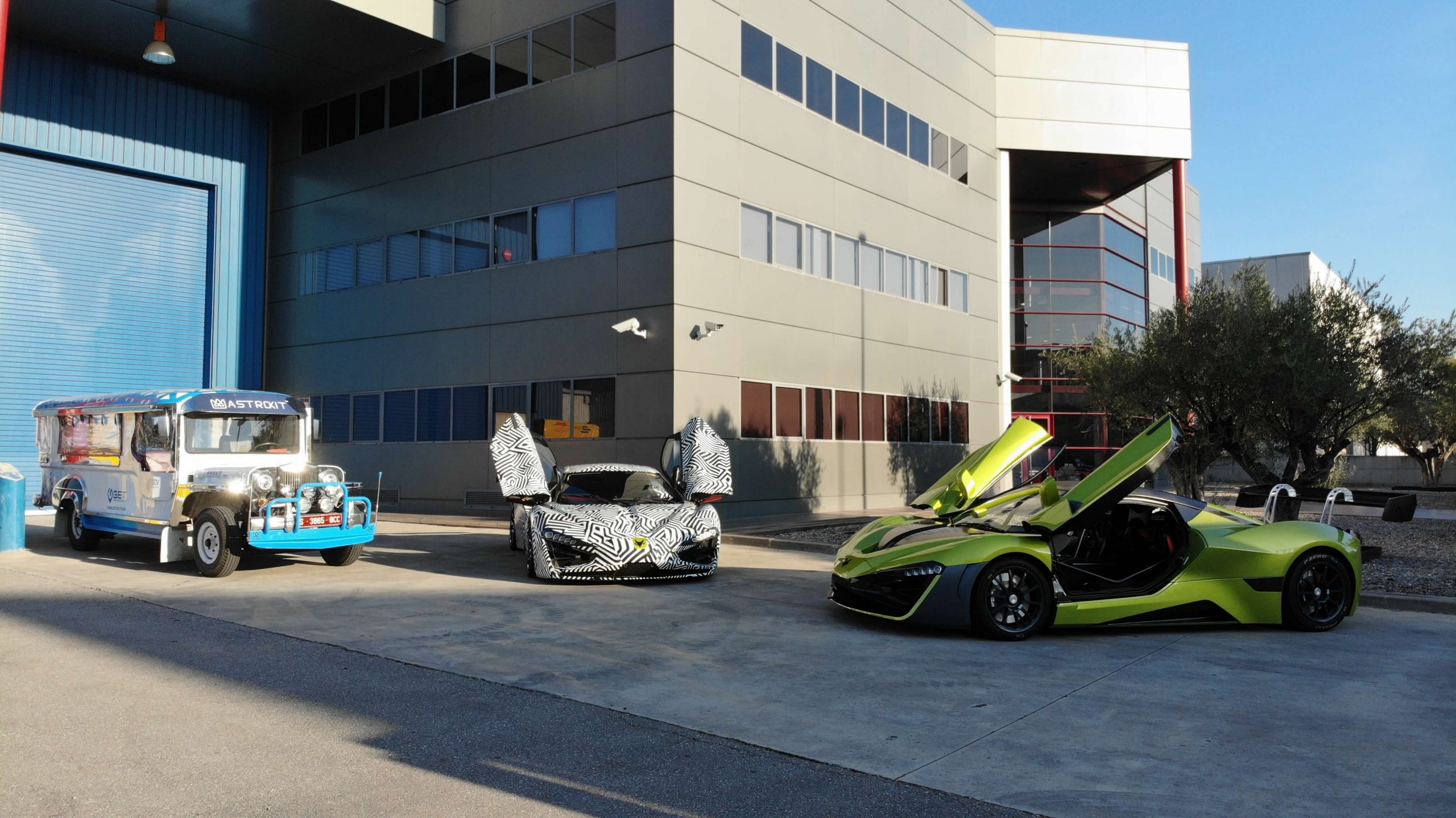 Arcfox GT and Arcfox GT Race Edition and eJeepney Prototypes_in front of QEV Tech